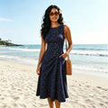 Women's Midi Dress — Sleeveless Polka Dot Fit & Flare Design